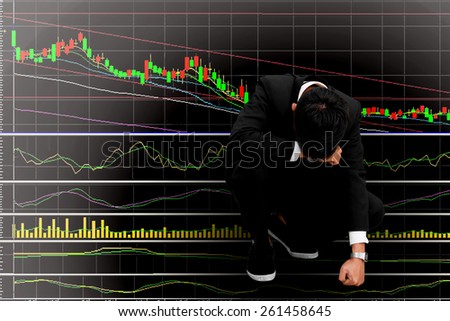 Business man serious a falling down graph of stock market