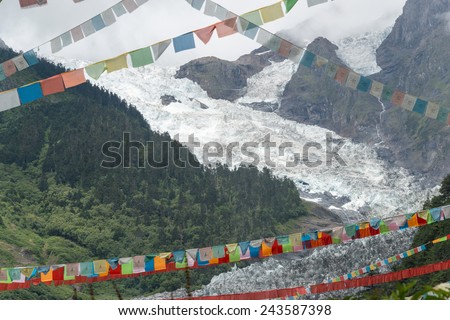 DEQIN, CHINA - Aug 5 2014: Prayer flags at Minyong Glacier. a famous landscape in Deqin, Yunnan, China.