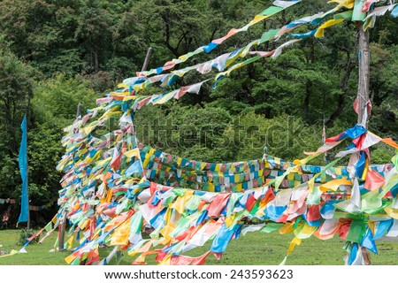 YUBENG, CHINA - Aug 9 2014: Prayer flag at Yubeng Village. a famous landmark in the Tibetan village of Deqin, Yunnan, China.