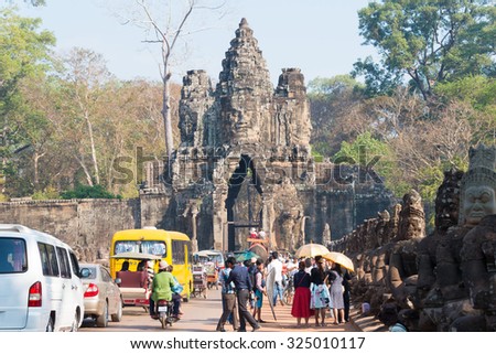 Siem Reap, Cambodia - Feb 3 2015: Visitors at Angkor Thom. a famous Historical site(UNESCO World Heritage Site) in Angkor, Siem Reap, Cambodia.