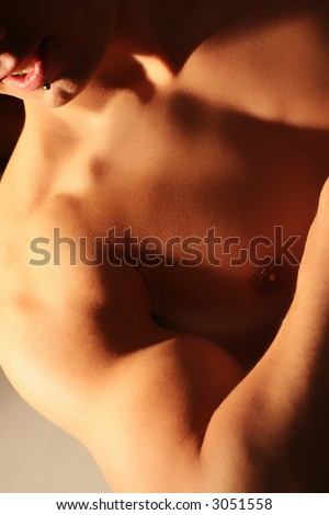 Muscular man body. Muscles on the arm. Nude man skin