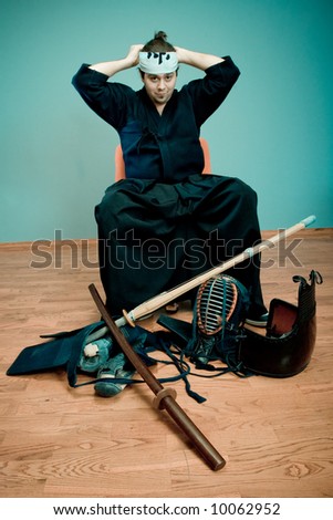 Kendo master with sword - japan martial art concept