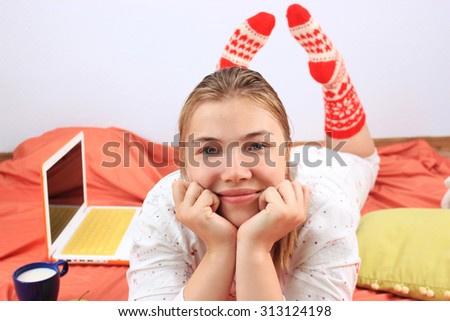 Sweet home or Cozy home background, Knitted socks, Knitted background, Healthy lifestyle, Sweet November, At home on laptop, Holiday, Day off, a Beautiful girl, Freelancer, Woman at home