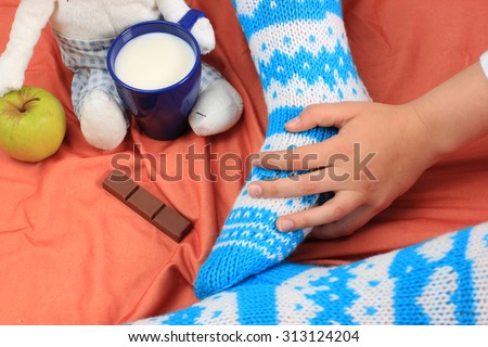Sweet home or Cozy home background, Knitted socks, Knitted background, Healthy lifestyle, Drinking milk, Milk and chocolate, Sweet November, Bed and breakfast, At home on laptop, Blue knitted socks