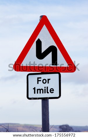 bendy road warning sign uk outdoor winter