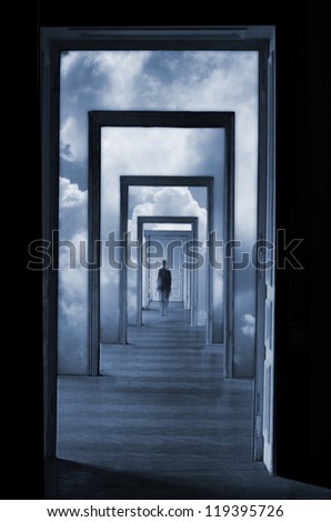 Within a Dream 1, silhouette in a corridor in front of a closed door. Rite of passage concept. Linear perspective view through several open doors and empty rooms.