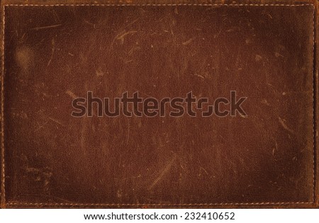 Brown grunge background from distress leather texture