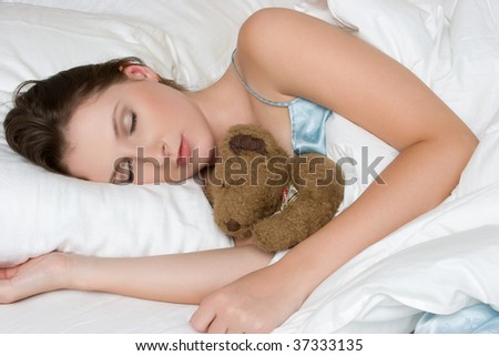 Woman Sleeping with Teddy Bear