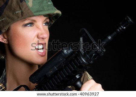 Female Soldier Carrying Gun