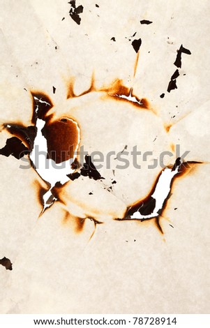 Burn hole in  paper