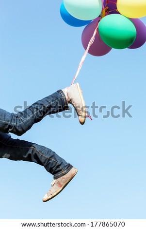 flying legs with balloons