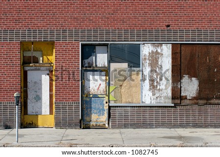 urban storefront in an old part of town, abandoned and in disrepair