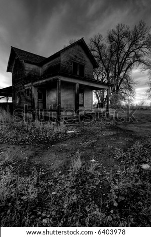 haunted house in rural Wyoming, processed HDR for dark, moody look with intentionally added grain.