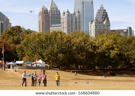 ATLANTA, GA - OCTOBER 26:  People fly kites in the World Kite Festival, at Piedmont Park on October 26, 2013 in Atlanta, GA.  The event was free and open to the public.