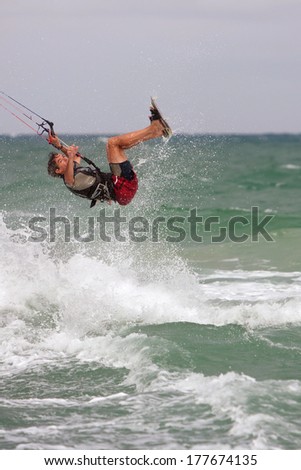 FT. LAUDERDALE, FL - DECEMBER 28:  A man catches air while parasail surfing off the coast of Florida over the Christmas holidays, on December 28, 2013 in Ft. Lauderdale.