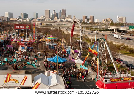 ATLANTA, GA - MARCH 15:  An elevated wide shot shows the annual Atlanta Fair, with city skyline in background, on March 15, 2014 in Atlanta, GA.  The fair has been an Atlanta tradition for 30 years.