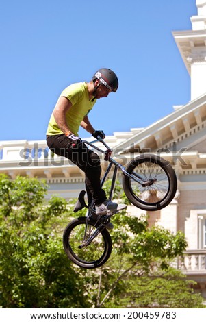 ATHENS, GA - APRIL 26:  A young man gets airborne practicing his ramp jumps at the BMX Trans Jam competition on the streets of downtown Athens, on April 26, 2014 in Athens, GA.