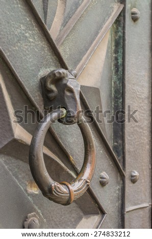Ram head bronze door knocker