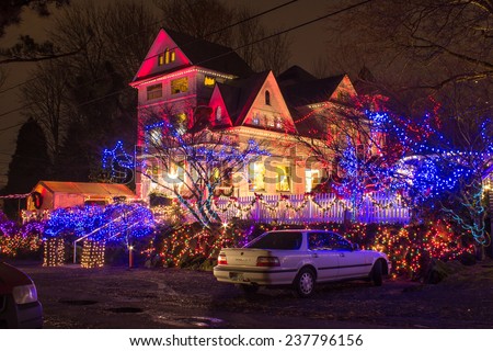 PORTLAND, OR - DECEMBER 13, 2014. Victorian Belle, Queen Anne Victorian Mansion in Christmas lights