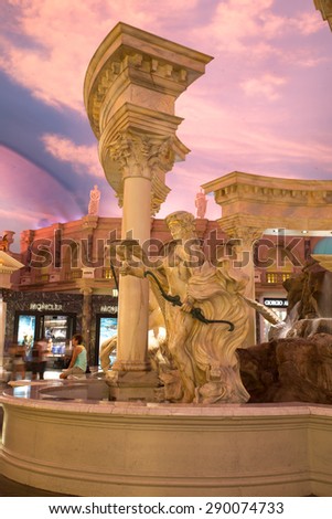 LAS VEGAS, NEVADA - JUNE 15, 2015. Caesars Palace Forum interior detail. Roman style statue and fountain