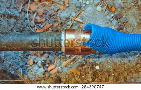 Cold water pipe on a broken floor