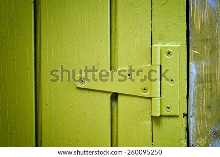 Yellow door hinge