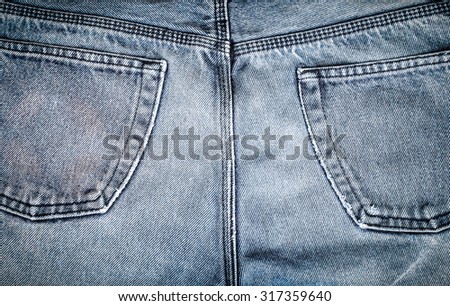 Background from the back of the jeans. Toned.