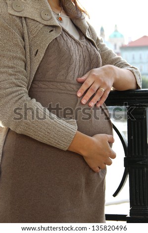 Beautiful pregnant woman tummy, detail