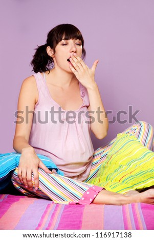 sleepy woman yawning