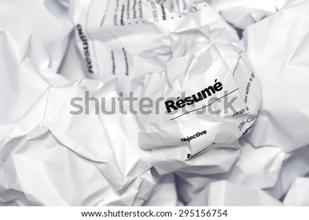 Resume in trash. Picture of resume crumpled up and thrown away in the trash.