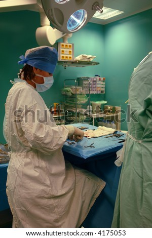 nurse with operating tools