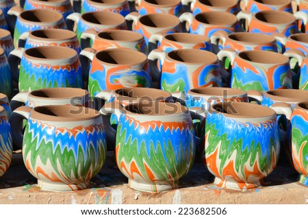 Handmade colored cups from in a moroccan pottery workshop