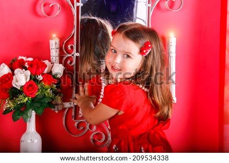 fashion little doll girl in red vanity mirror with lipstick