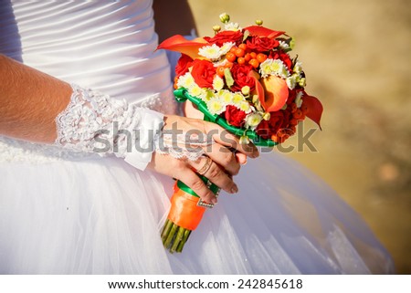 Bride holding wedding bouquet. Wedding bouquet of lilies