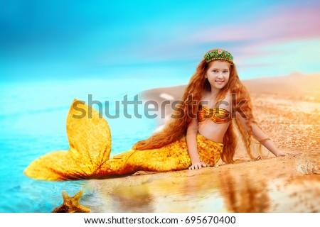 Similar – Image, Stock Photo Redhead fairytale female mermaid swimming underwater