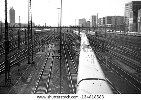 Train line crossing in black and white