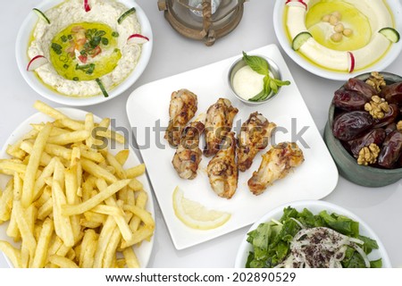 Arabic food presented on a table in a restaurant, served in ramadan