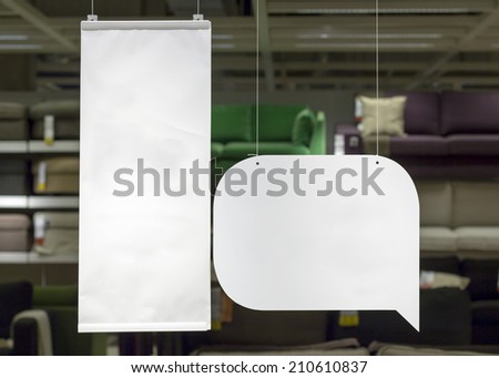 blank advertising flags hanging  in shop