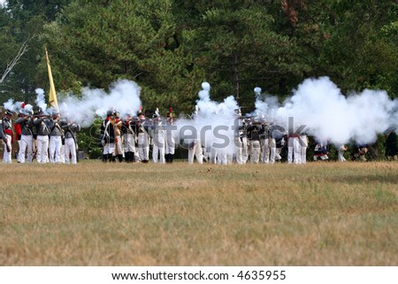 American solders firing at a War of 1812 battle re-enactment at Ft. Erie, Ontario, Canada