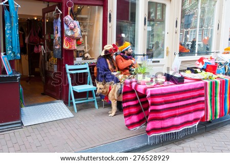 AMSTERDAM,NETHERLANDS-APRIL 27:  Local people display their things for sale on King\'s Day on April 27, 2015 in Amsterdam, Netherlands. King\'s Day is the largest open-air festivity in Amsterdam.