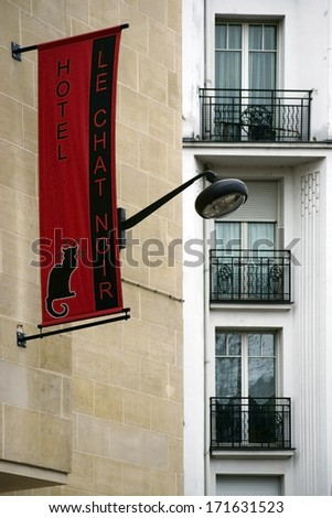 PARIS, FRANCE - JANUARY 1: The entrance sign for the hotel Le chat noir in the famous Montmartre district on January 01, 2014 in Paris / Hotel Le chat Noir in Paris