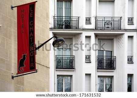 PARIS, FRANCE - JANUARY 1: The entrance sign for the hotel Le chat noir in the famous Montmartre district on January 01, 2014 in Paris / Hotel Le chat Noir in Paris