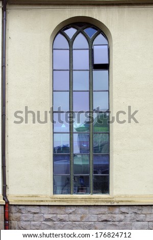 The photograph of a church window with colored panes of glass / Church window