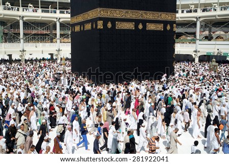 MECCA SAUDI ARABIA  FEBRUARY 4: Muslim pilgrims from all around the World revolving around the Kaaba on February 4 2015 in Mecca Saudi Arabia. Muslim people praying together at holy place.