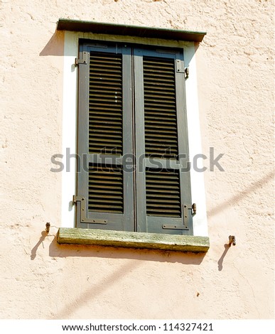 Window on the house in the town on the mountain hill called Gandria, Switzerland