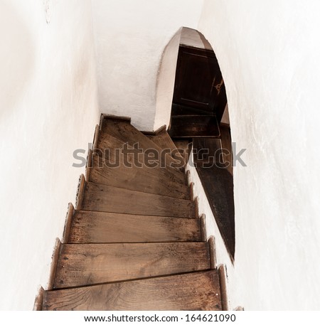 BRAN, ROMANIA - OCTOBER 27, 2013:  Stairs in the Dracula Castle in Bran, Romania, on October 27, 2013.  It is marketed as the home of the Vampire Dracula, the Bram Stoker\'s novel character.
