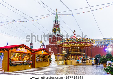 MOSCOW, RUSSIA - DECEMBER 17, 2013: Christmas fair in the middle of the Red Square in Moscow, Russia in Dec.17, 2013. These fairs originated in Germany, Austria, South Tyrol, North Italy