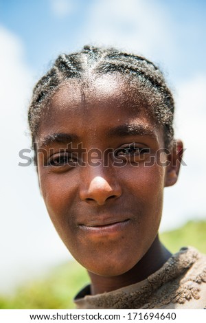 OMO VALLEY, ETHIOPIA - SEP 19, 2011: Portrait of an unidentified Ethiopian boy in Ethiopia, Sep.19, 2011. People in Ethiopia suffer of poverty due to the unstable situation