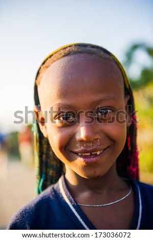 AKSUM, ETHIOPIA - SEP 30, 2011: Portrait of an unidentified Ethiopian cute little boy in Ethiopia, Sep.30, 2011. Children in Ethiopia suffer of poverty due to the unstable situation