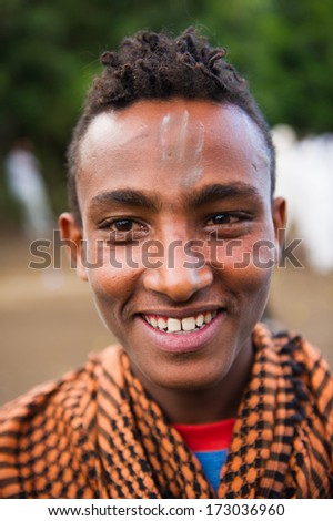 AKSUM, ETHIOPIA - SEP 28, 2011: Portrait of an unidentified Ethiopian man in Ethiopia, Sep.28, 2011. Children in Ethiopia suffer of poverty due to the unstable situation